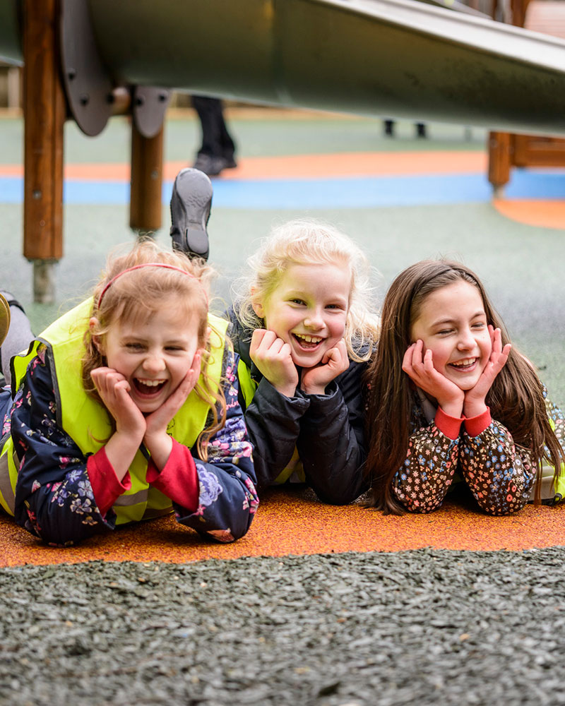 Three kids laughing.